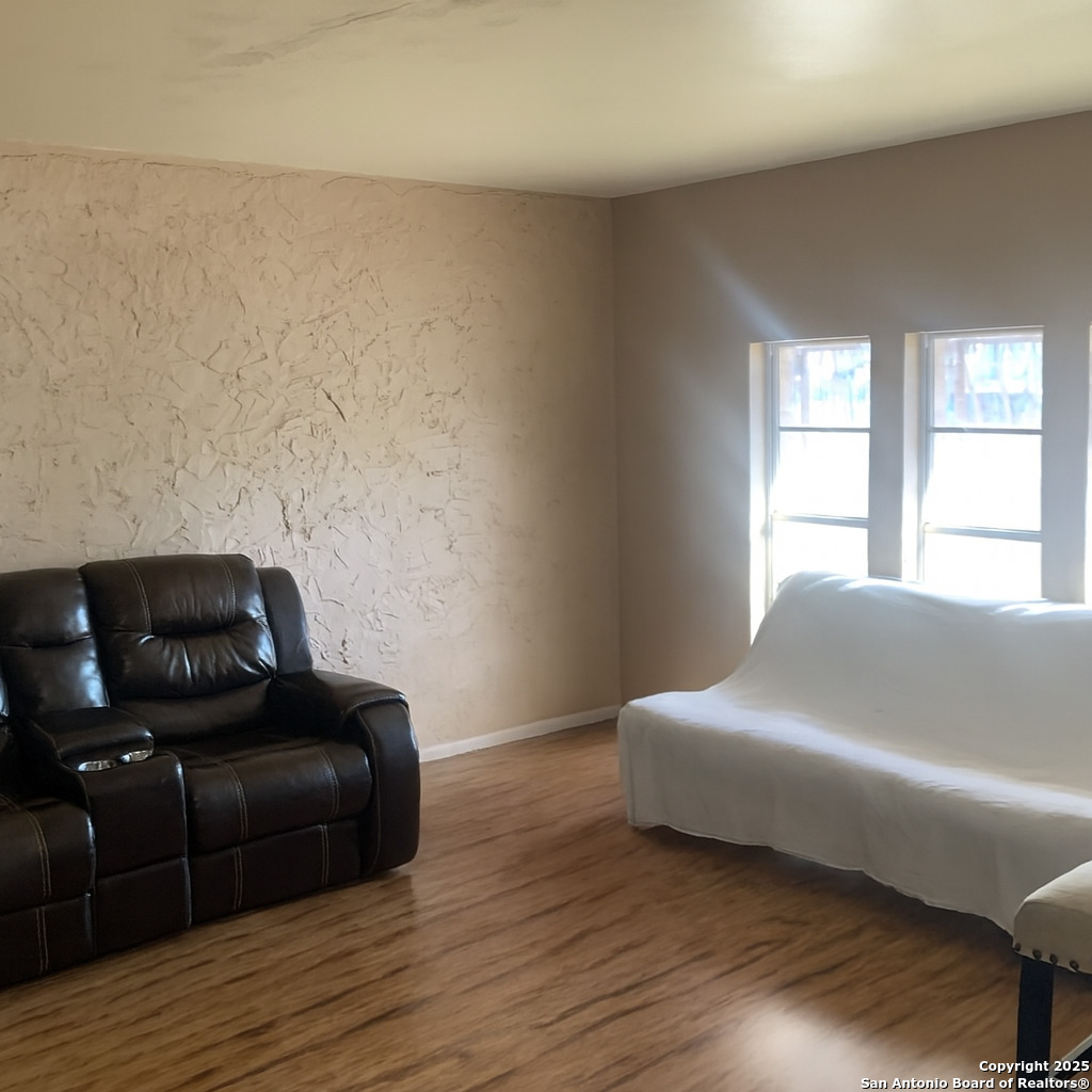 127 Roesler Road San Antonio, TX 78220 - Photo 8 of 17 a bedroom with a bed and a couch