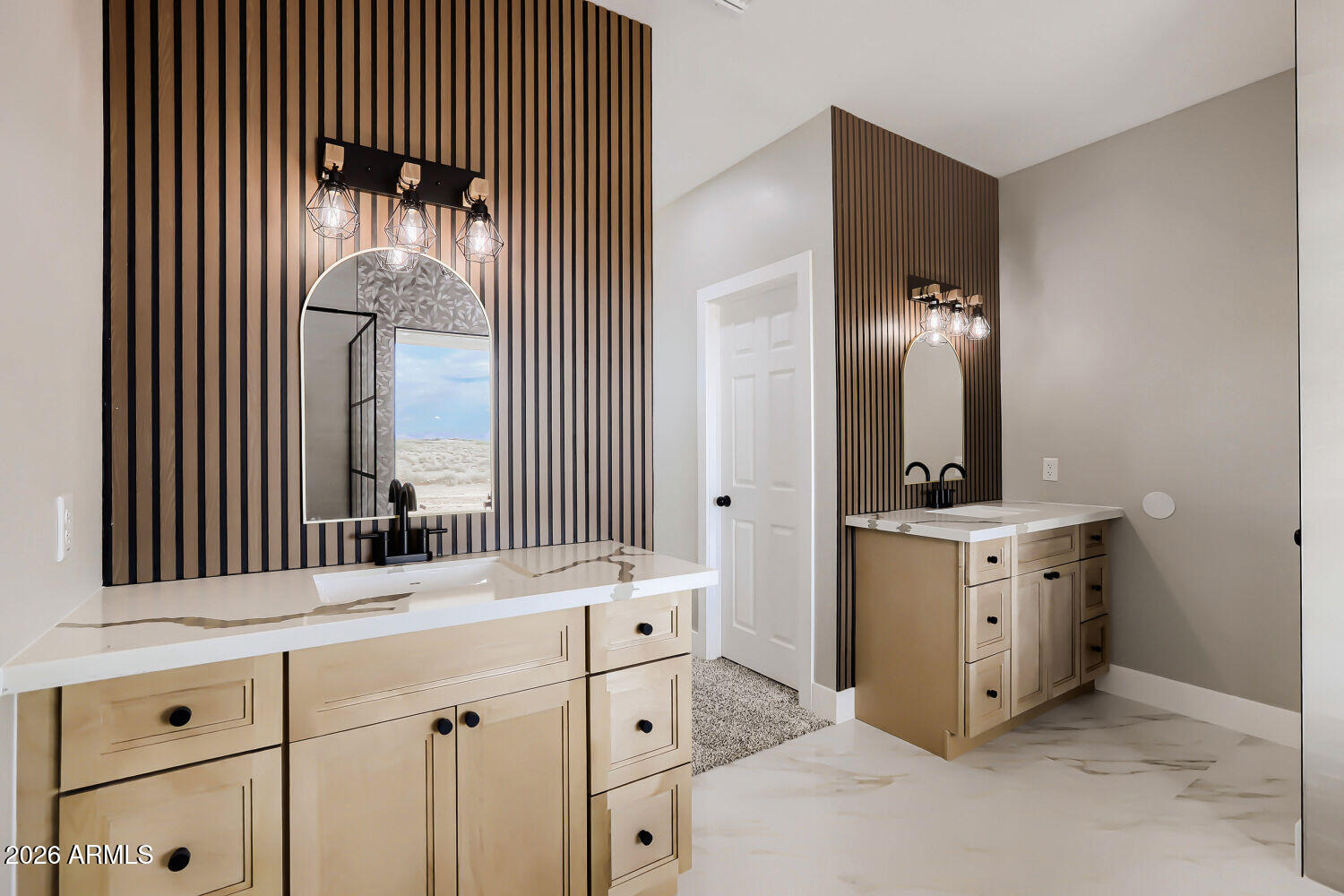 38420 West Buckeye Road Tonopah, AZ 85354 - Photo 19 of 28 a bathroom with a double vanity sink and mirror