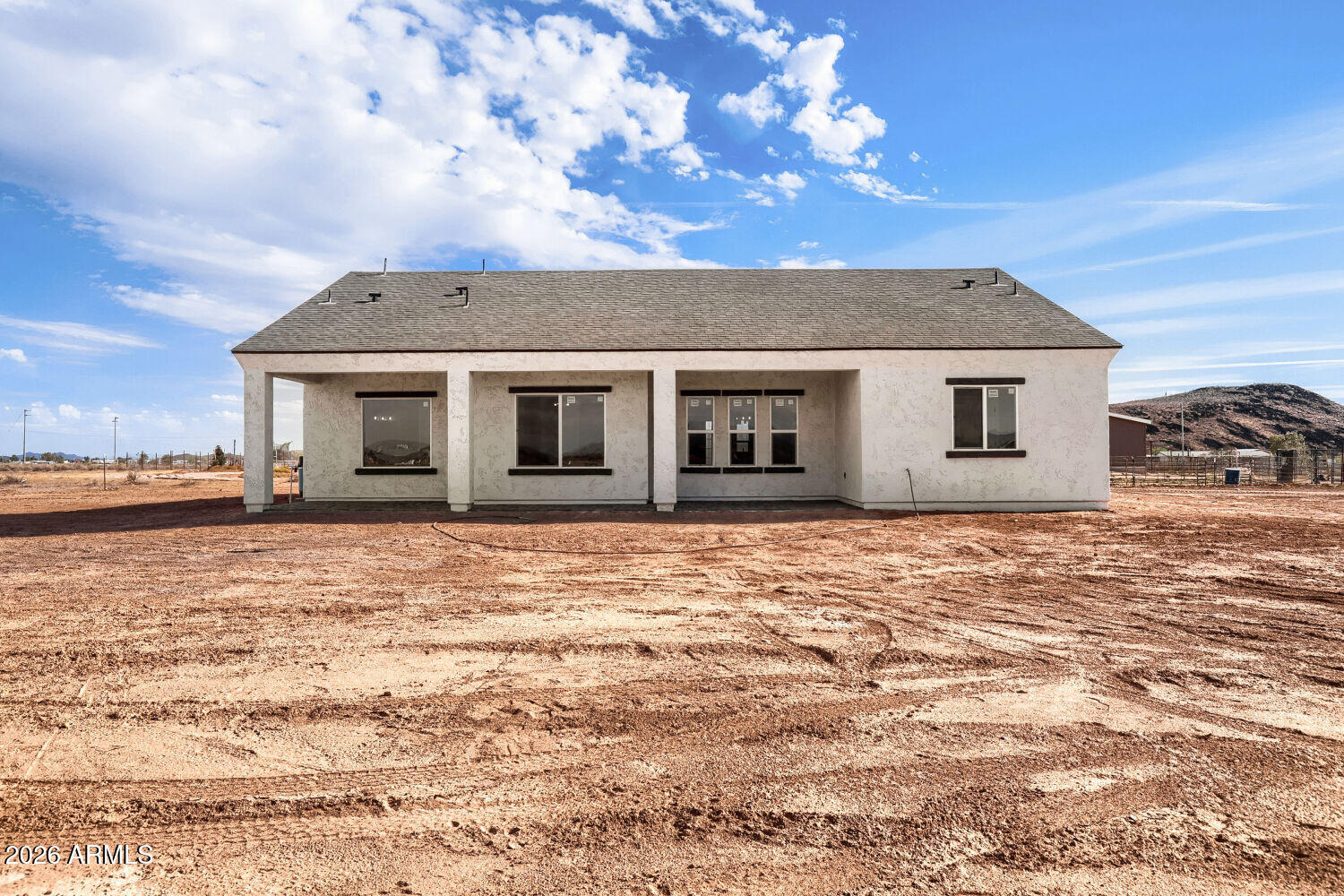 38420 West Buckeye Road Tonopah, AZ 85354 - Photo 28 of 28 a house with trees in the background