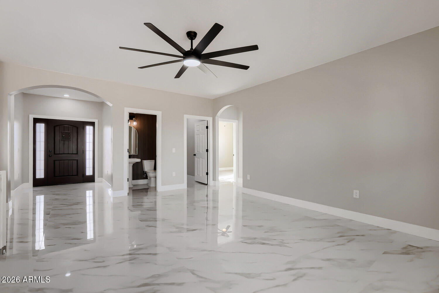 38420 West Buckeye Road Tonopah, AZ 85354 - Photo 6 of 28 a view of a livingroom with a ceiling fan