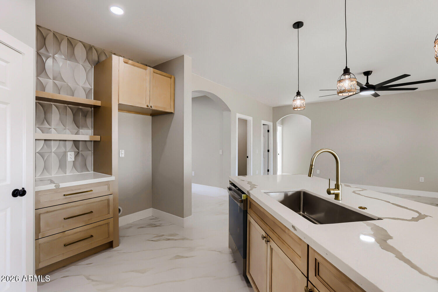 38420 West Buckeye Road Tonopah, AZ 85354 - Photo 10 of 28 a kitchen with a sink and a stove top oven