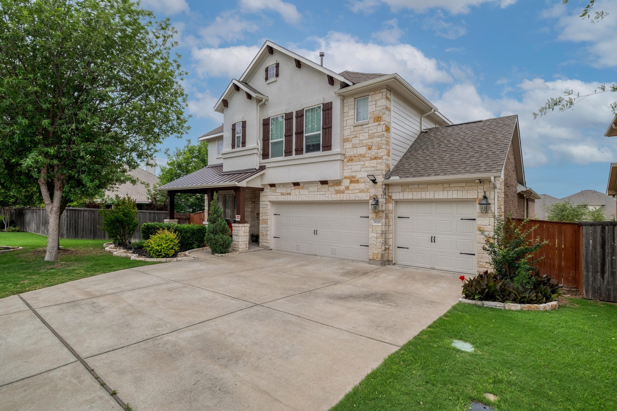 3040 Sachen Street Georgetown, TX 78626 - Photo 2 of 40 a view of a white house next to a yard and a large tree