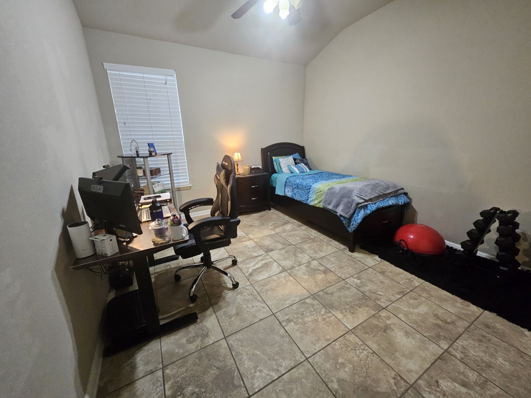 3040 Sachen Street Georgetown, TX 78626 - Photo 21 of 40 a bedroom with a bed and gym equipment
