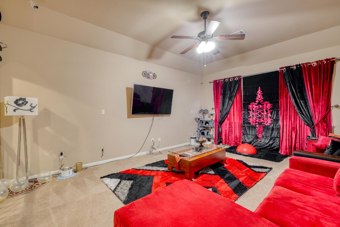 3040 Sachen Street Georgetown, TX 78626 - Photo 24 of 40 a bedroom with a bed and a flat screen tv