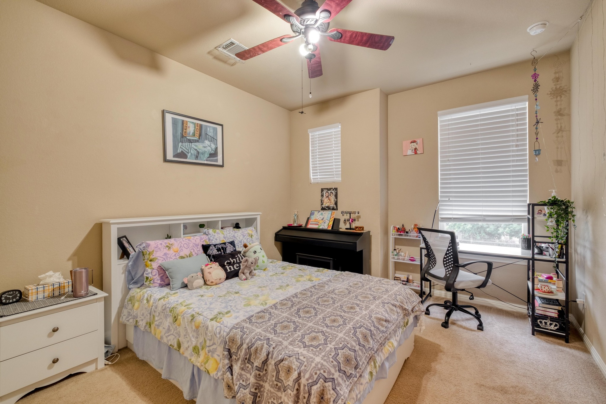 3040 Sachen Street Georgetown, TX 78626 - Photo 26 of 40 Bedroom featuring light carpet, a ceiling fan, and an office area
