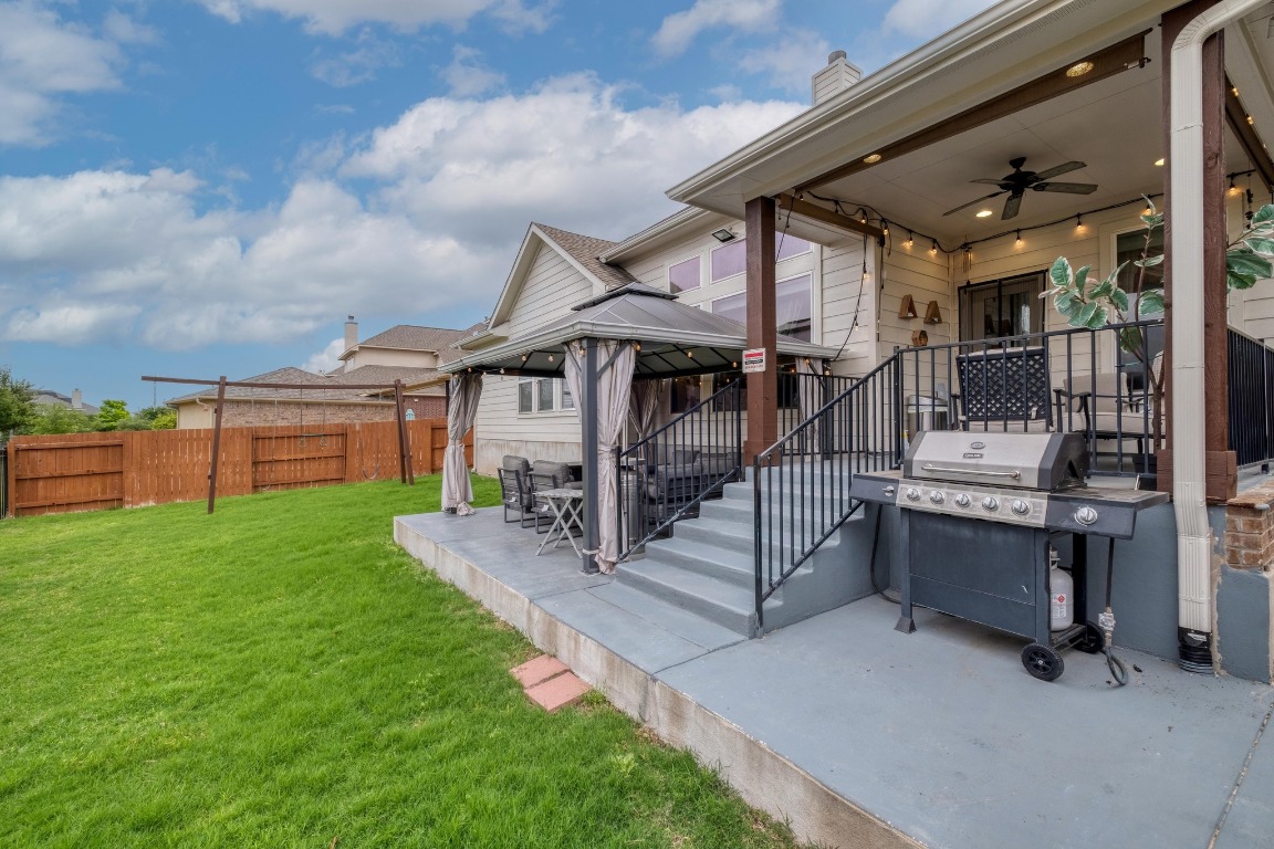 3040 Sachen Street Georgetown, TX 78626 - Photo 34 of 40 a porch with a table and chairs