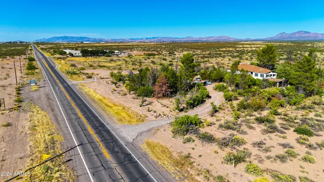 a view of city with ocean