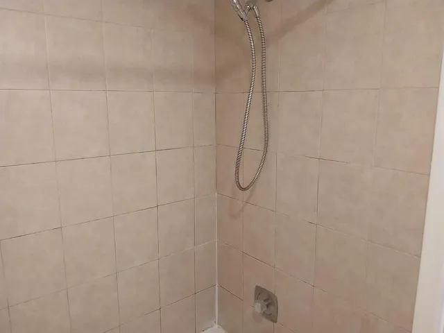 a bathroom with a sink and toilet