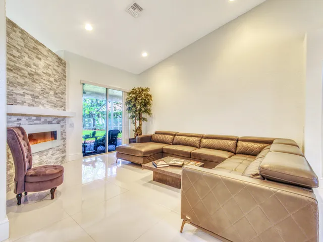 a living room with furniture and a couch