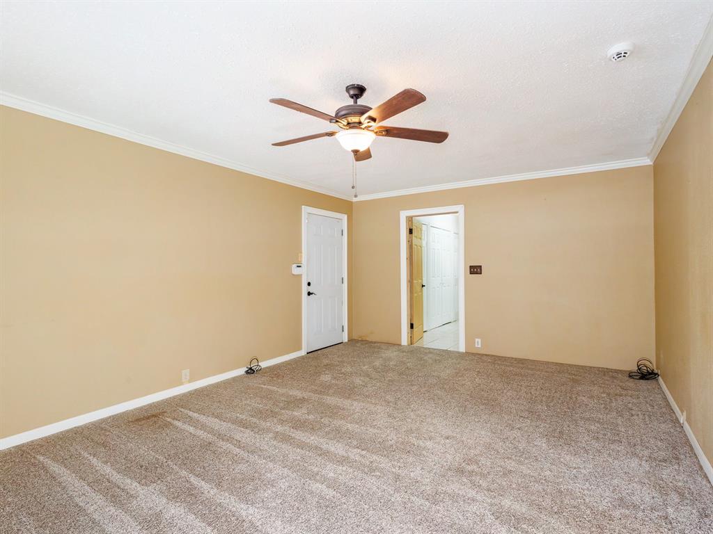 4002 Austin Avenue Brownwood, TX 76801 - Photo 13 of 34 a view of a big room with carpet