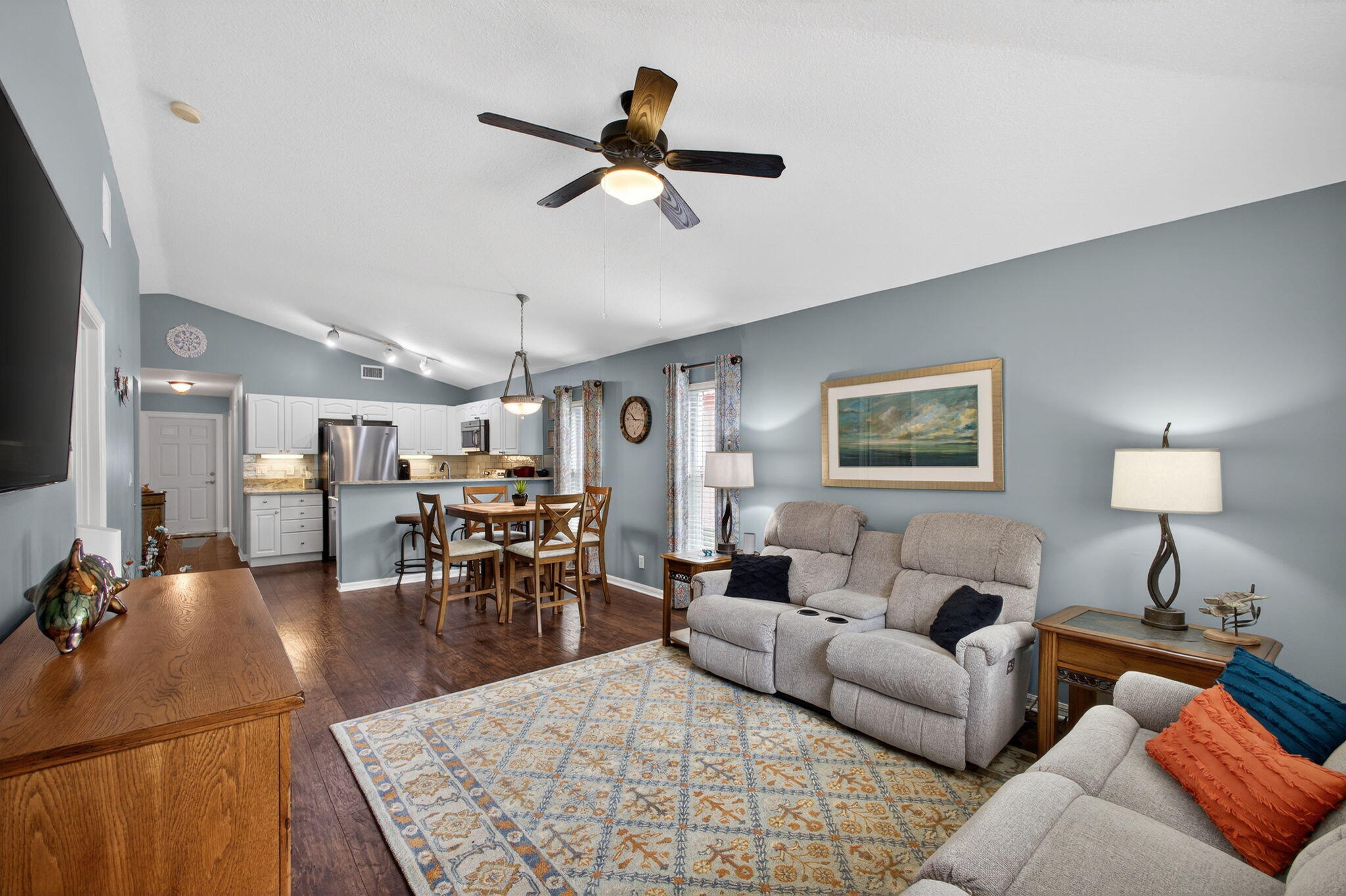 1095 Via Jardin Riviera Beach, FL 33418 - Photo 15 of 44 a living room with furniture and a wooden floor