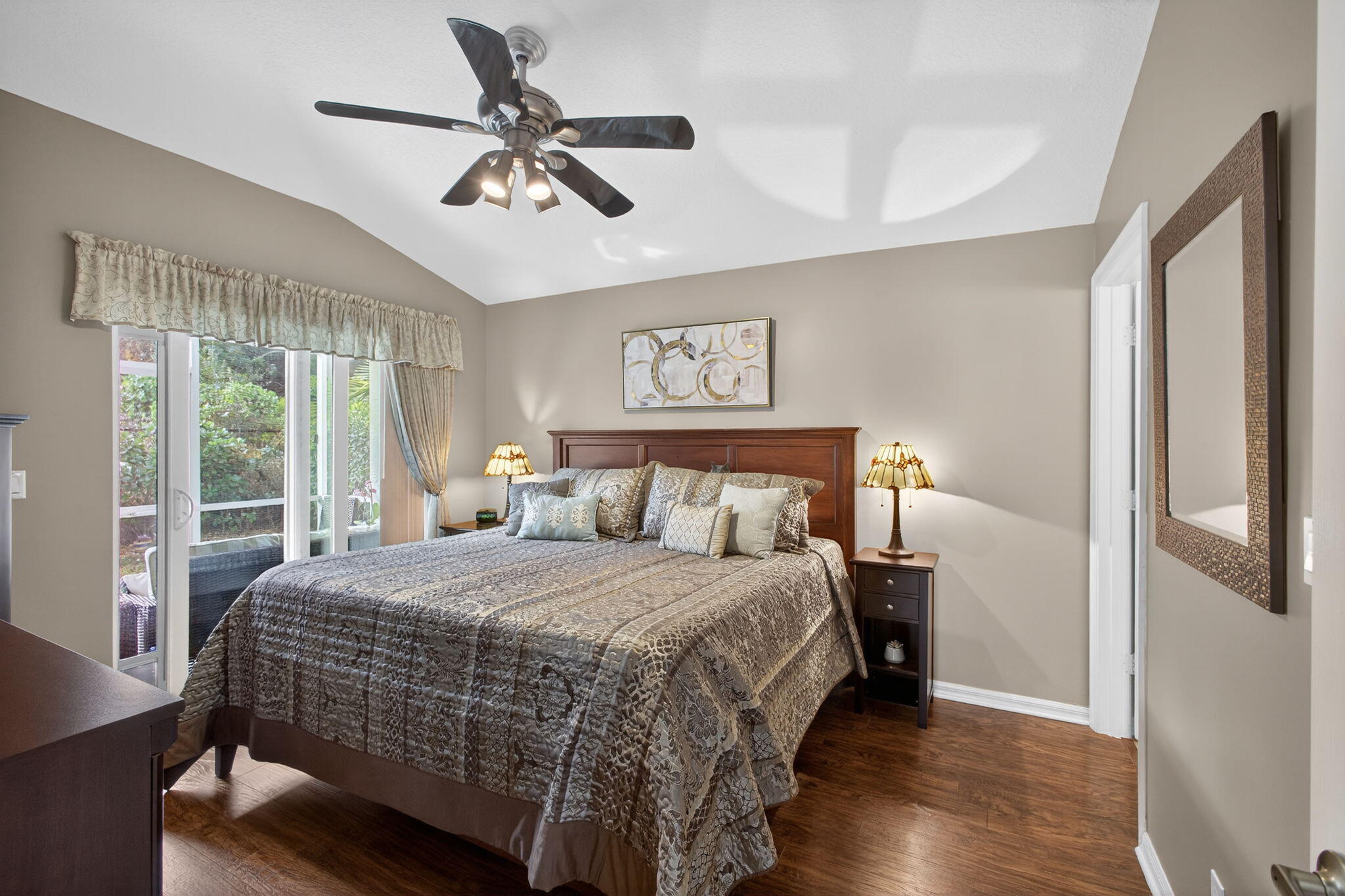 1095 Via Jardin Riviera Beach, FL 33418 - Photo 17 of 44 a bedroom with a bed and window