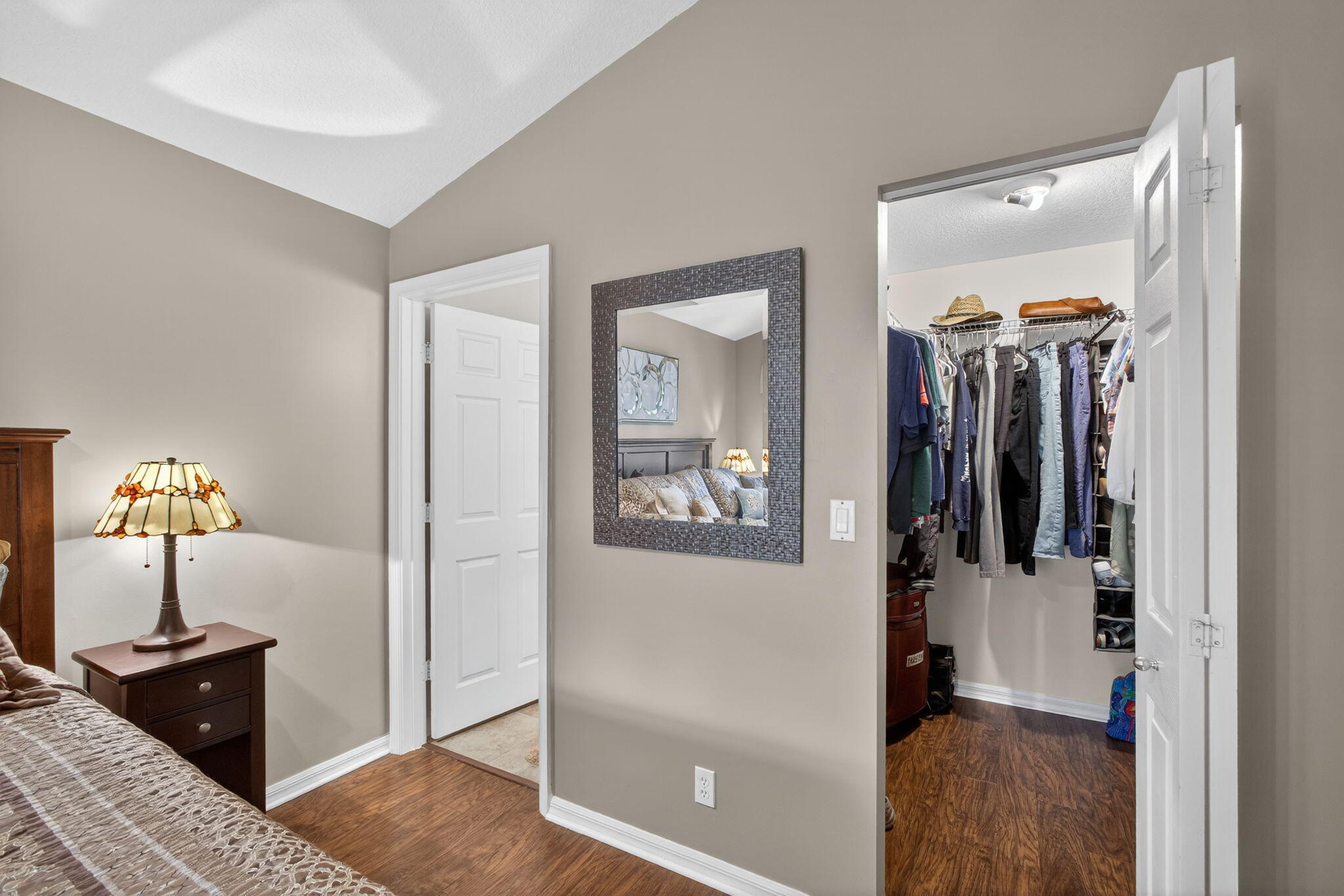 1095 Via Jardin Riviera Beach, FL 33418 - Photo 20 of 44 a view of a hallway with a livingroom and a window