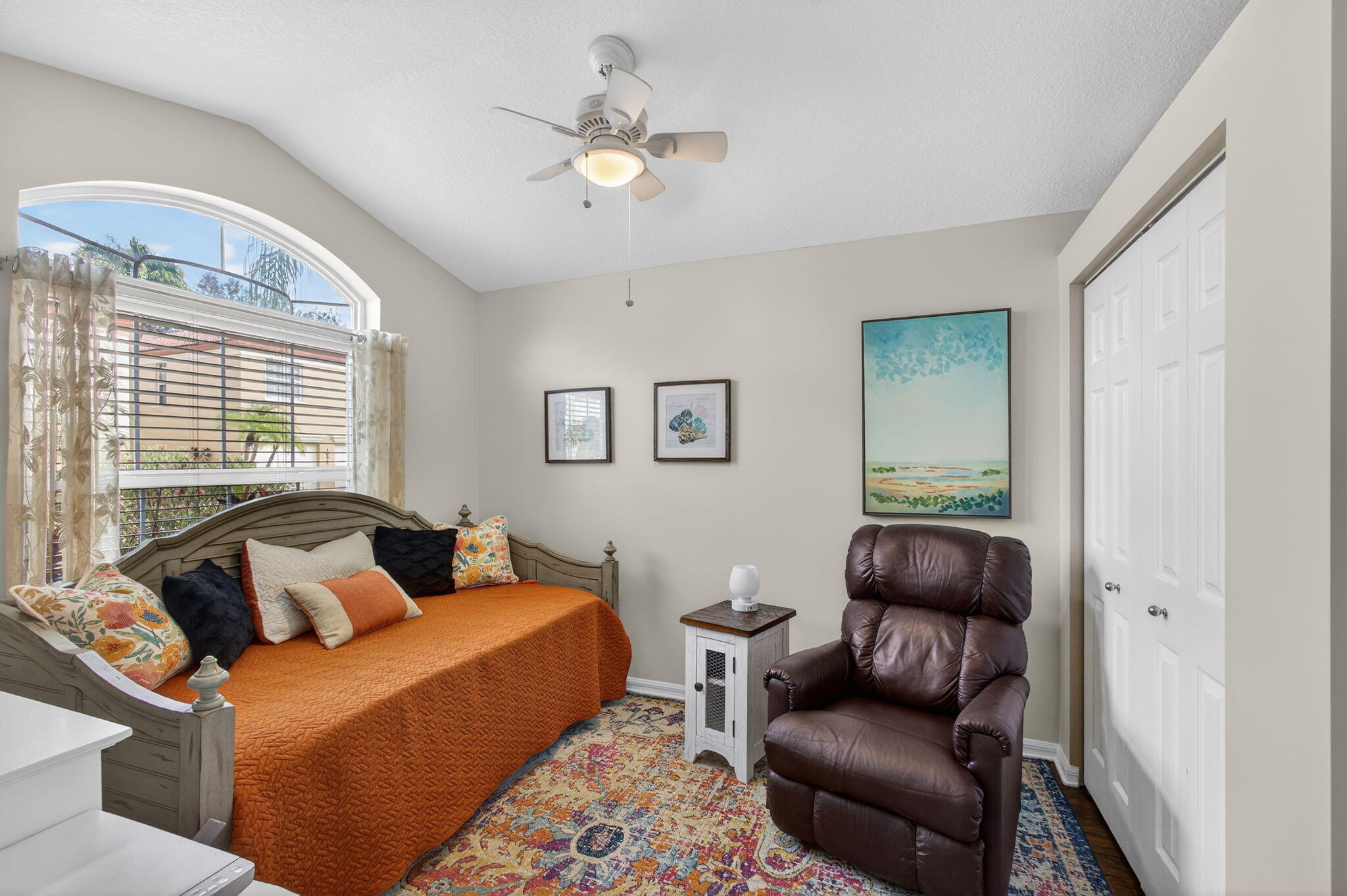 1095 Via Jardin Riviera Beach, FL 33418 - Photo 23 of 44 a living room with furniture and a large window