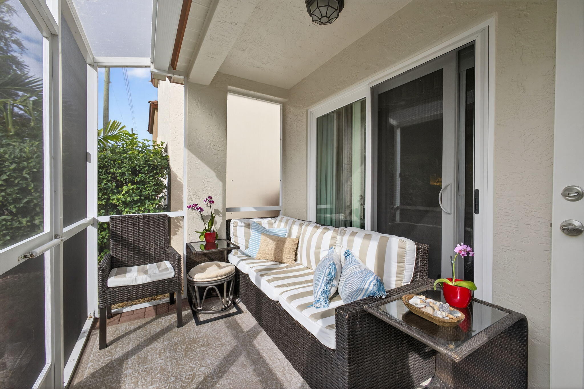1095 Via Jardin Riviera Beach, FL 33418 - Photo 26 of 44 a living room with furniture and a window