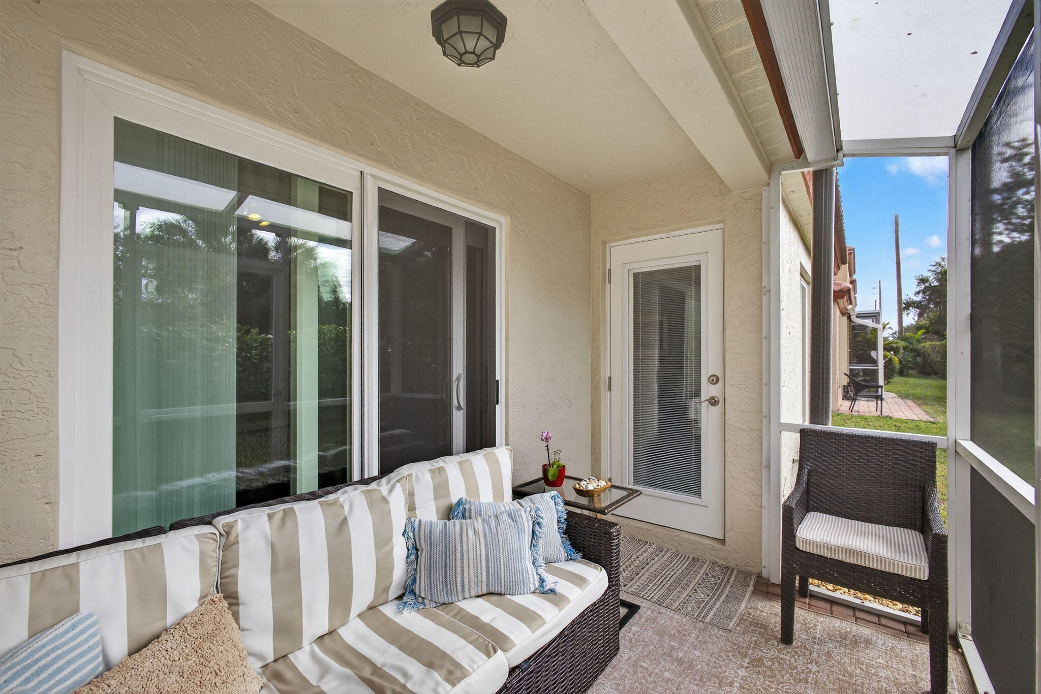 1095 Via Jardin Riviera Beach, FL 33418 - Photo 27 of 44 a living room with furniture and a window