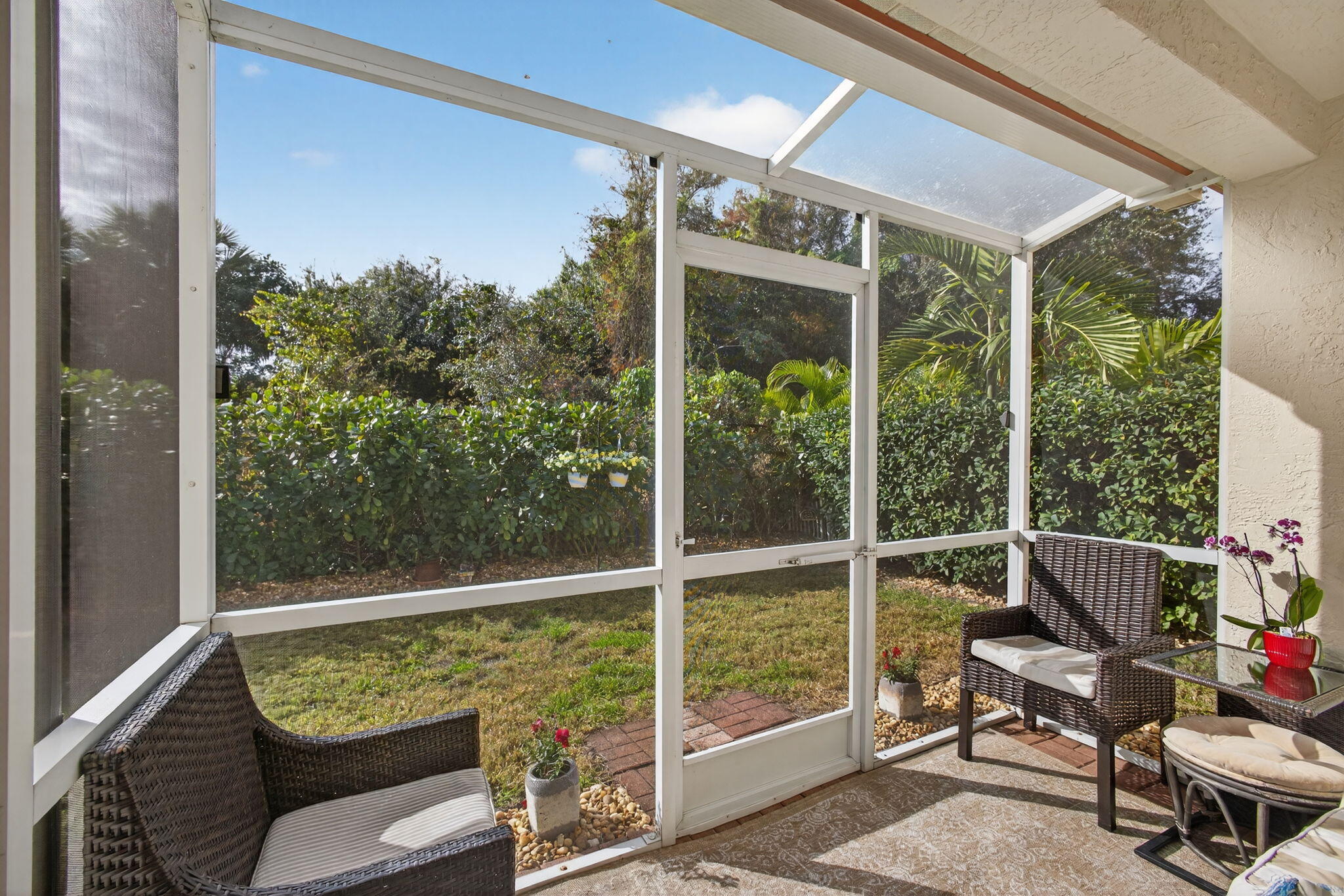1095 Via Jardin Riviera Beach, FL 33418 - Photo 28 of 44 a view of a chair and table in the balcony