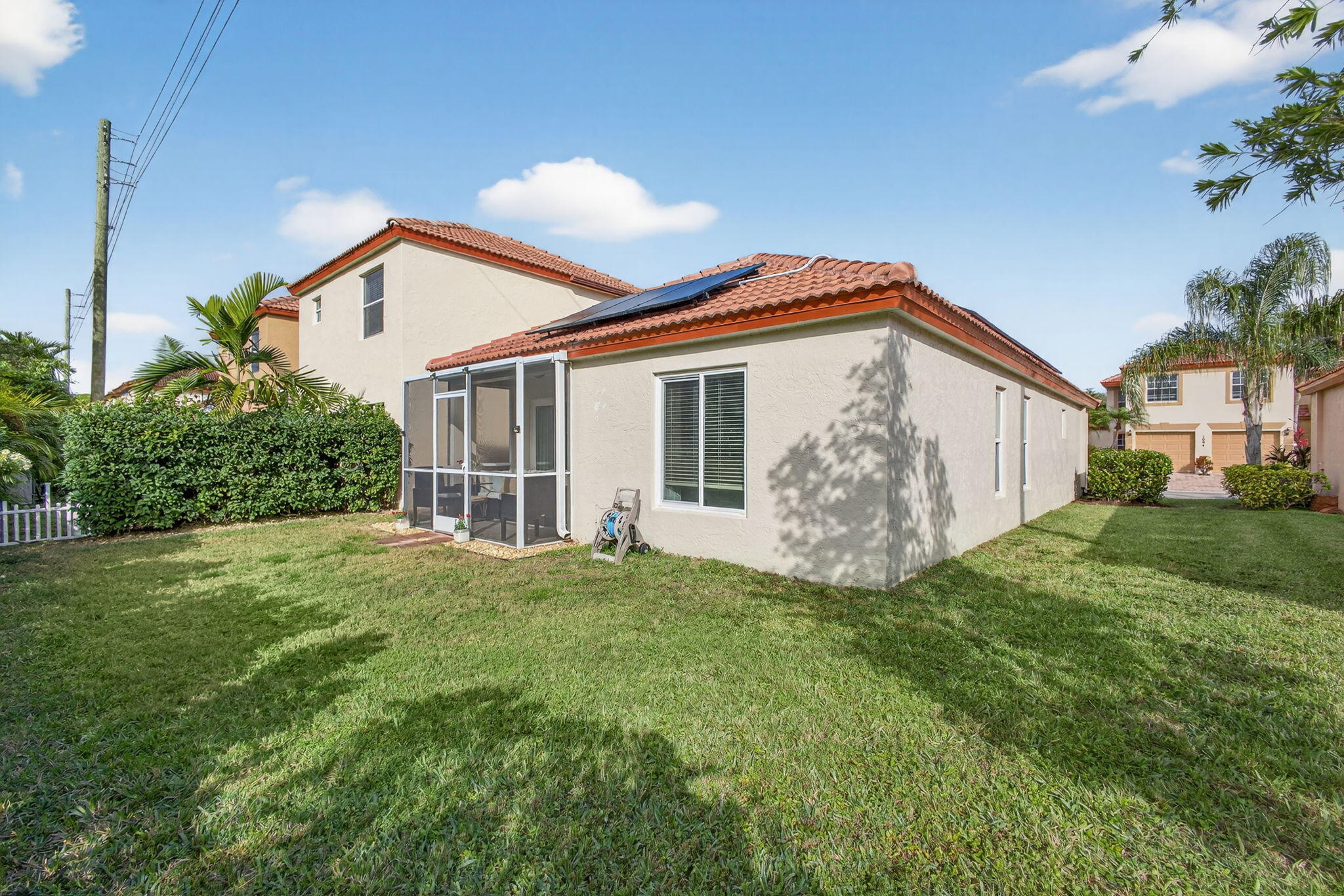 1095 Via Jardin Riviera Beach, FL 33418 - Photo 33 of 44 a view of a house with backyard and garden
