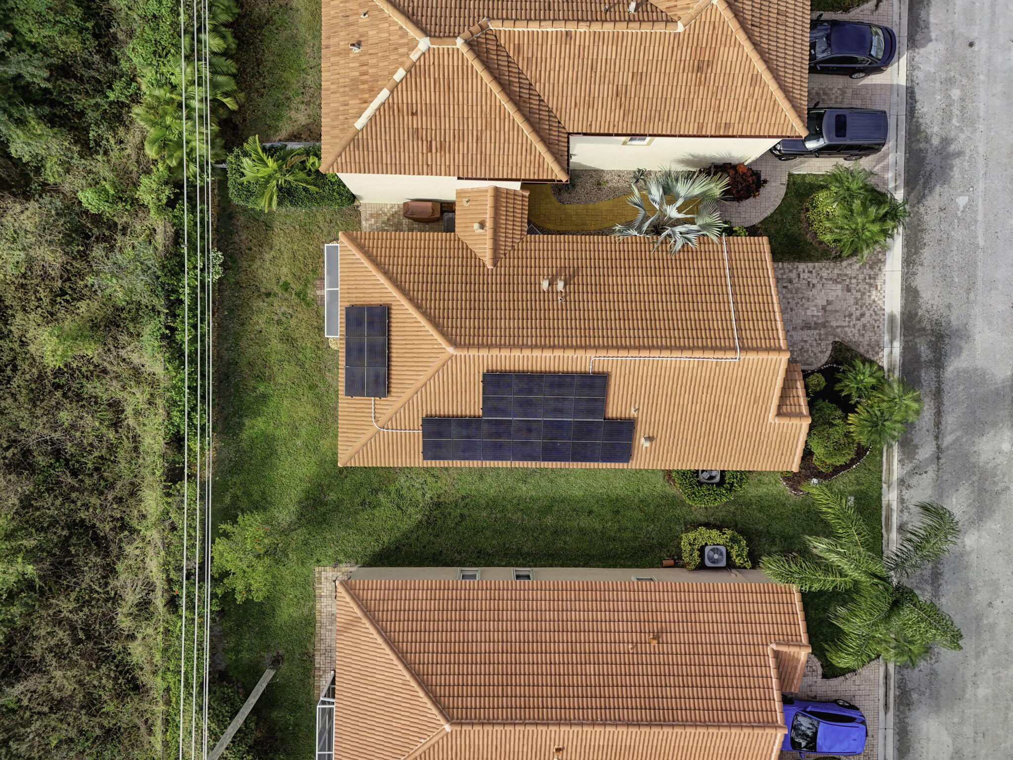 1095 Via Jardin Riviera Beach, FL 33418 - Photo 36 of 44 a view of a house with a yard