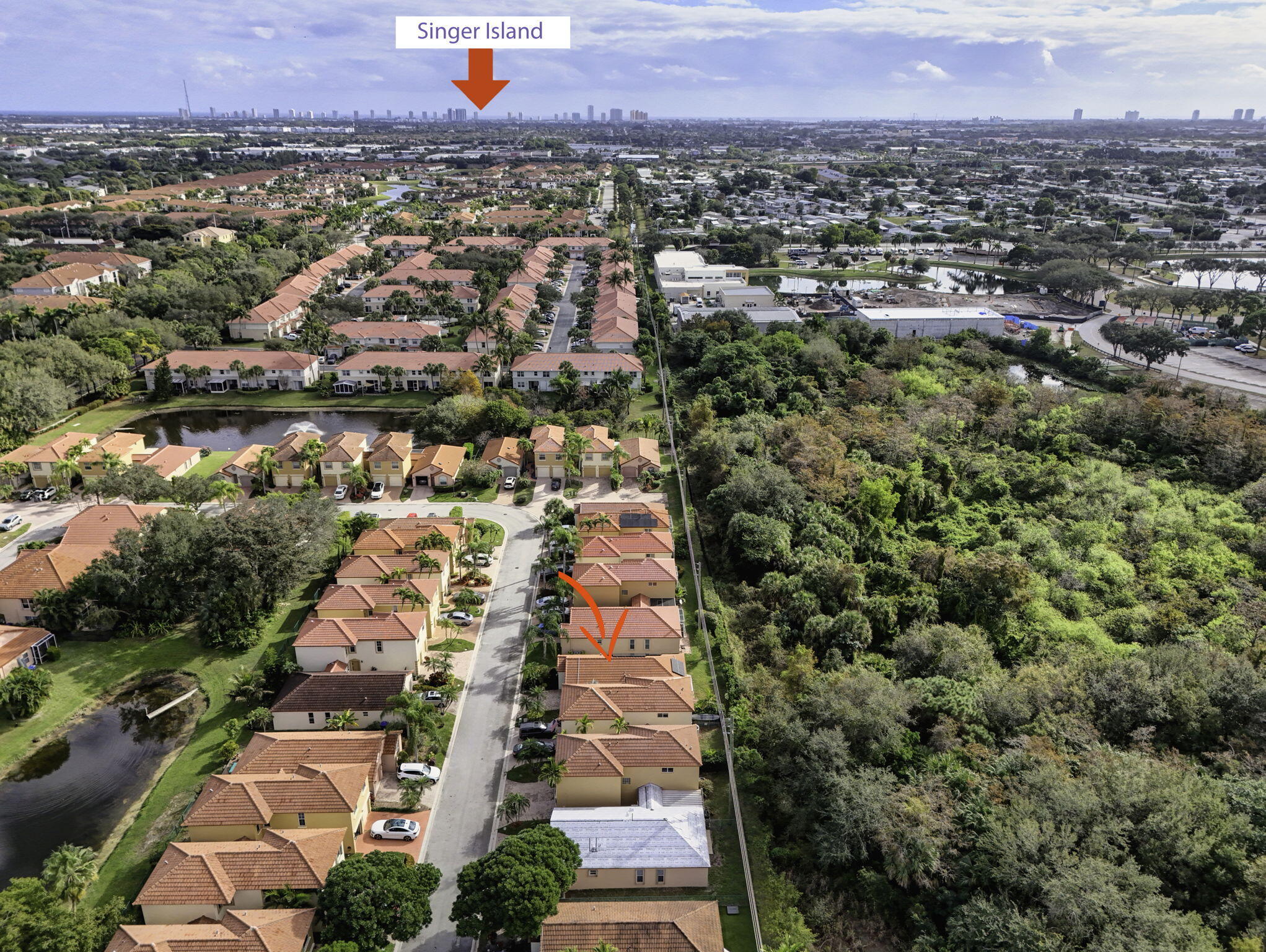 1095 Via Jardin Riviera Beach, FL 33418 - Photo 43 of 44 an aerial view of residential houses with outdoor space