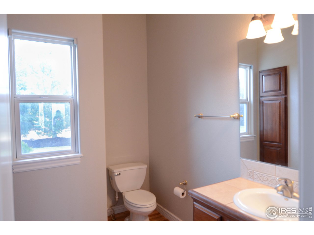 1797 Ridge W Drive Windsor, CO 80550 - Photo 11 of 33 a bathroom with a sink and a toilet