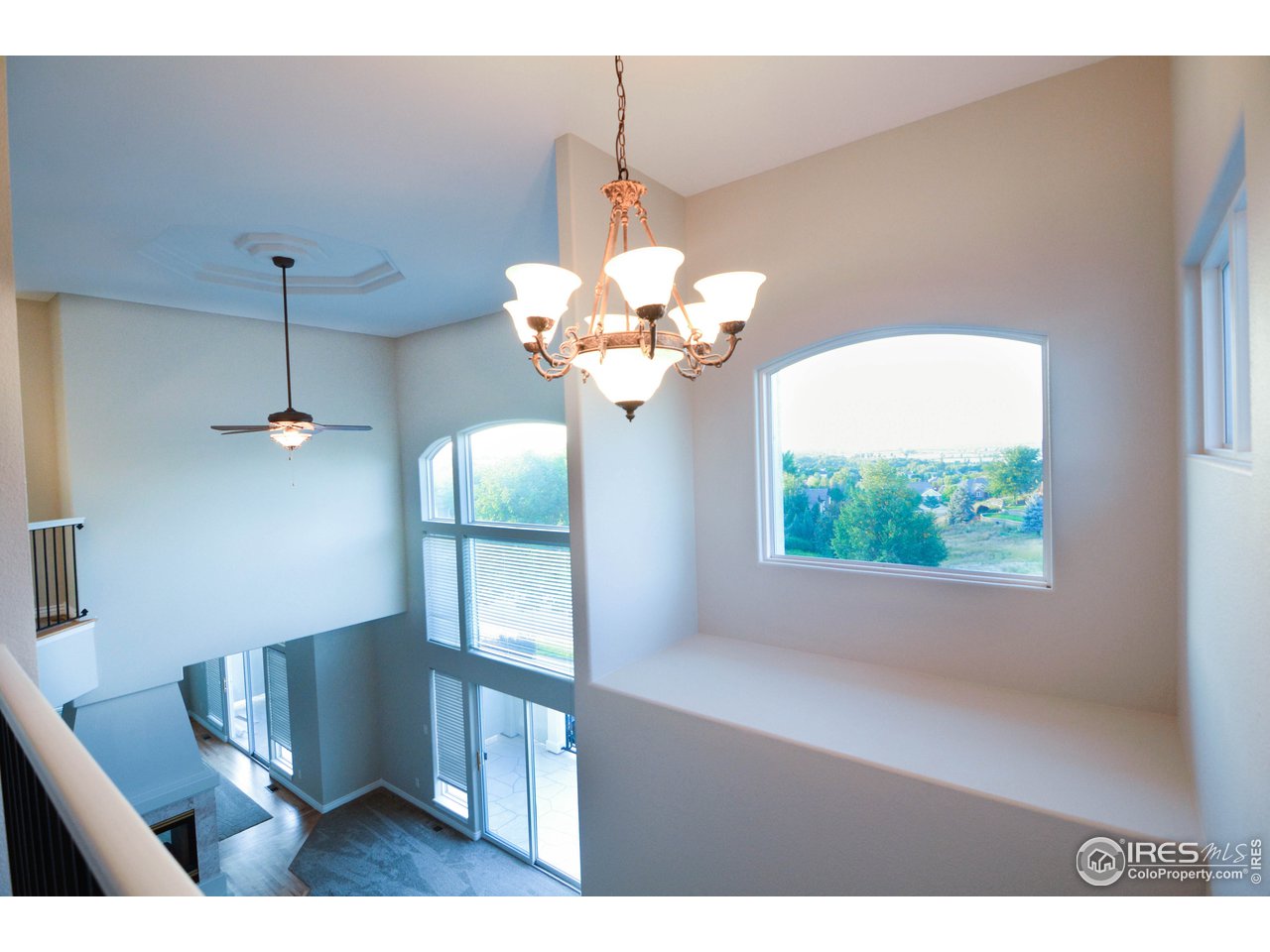 1797 Ridge W Drive Windsor, CO 80550 - Photo 14 of 33 a view of a dining room with a chandelier
