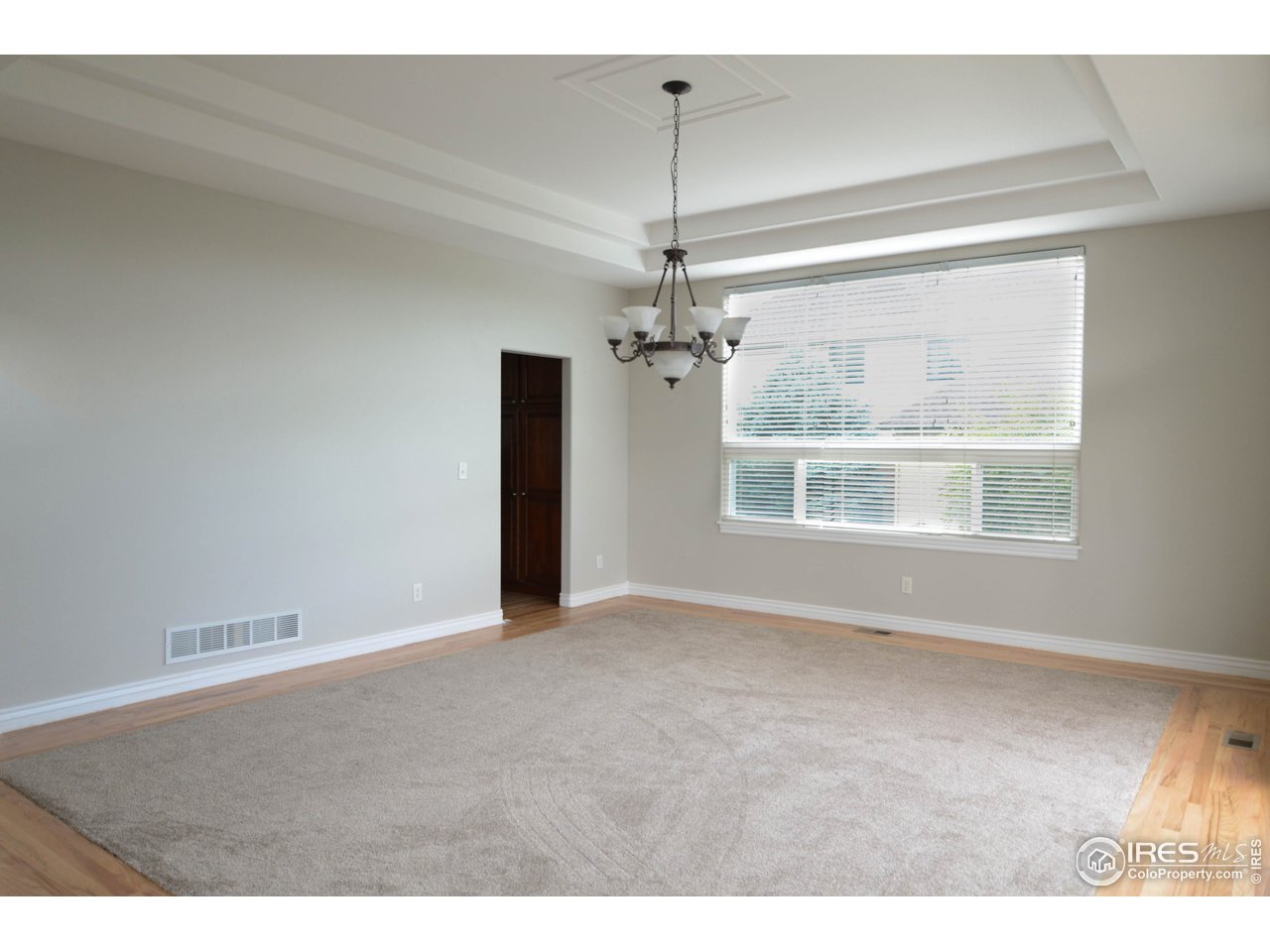 1797 Ridge W Drive Windsor, CO 80550 - Photo 5 of 33 a view of an empty room with a window