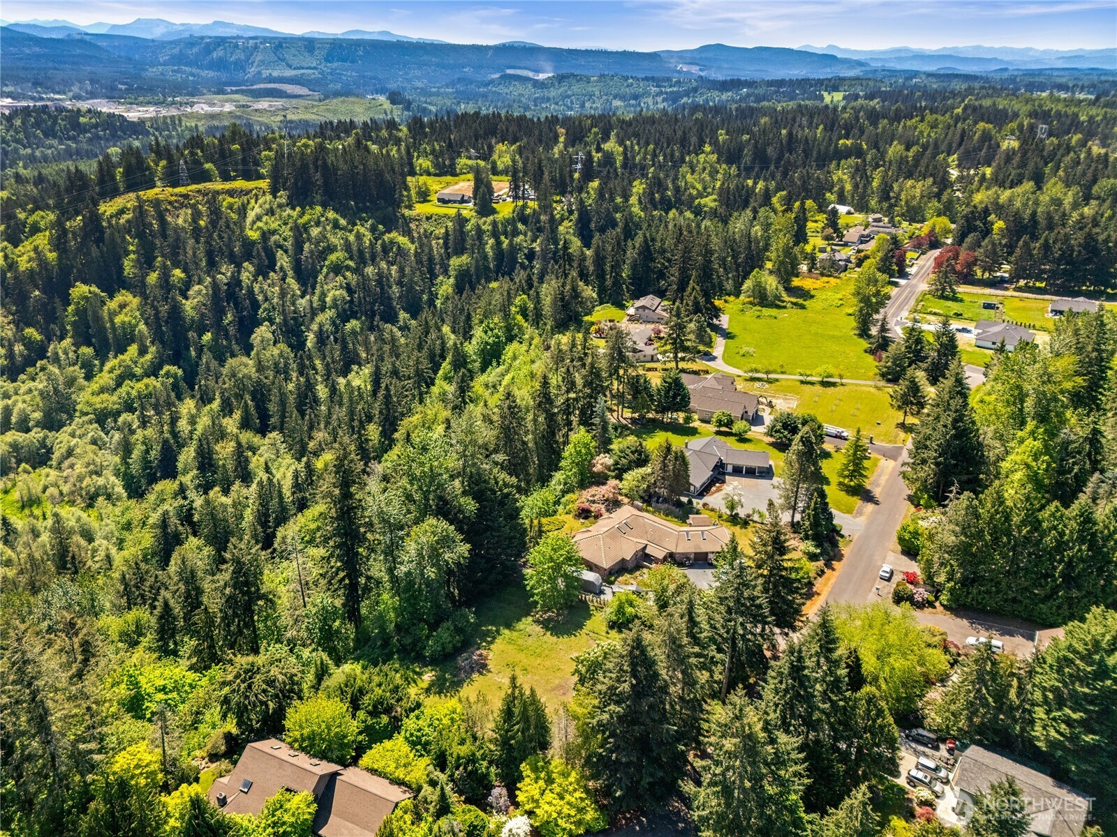 23519 Rim Road Graham, WA 98338 - Photo 7 of 23 a view of a city with mountains in the background