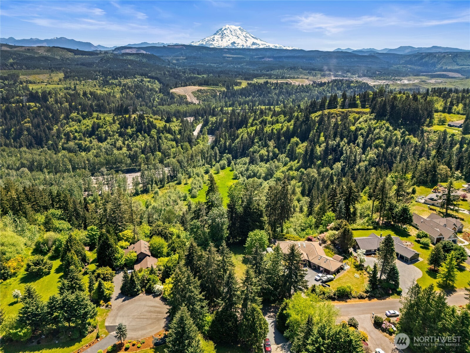 23519 Rim Road Graham, WA 98338 - Photo 8 of 23 a view of a city with mountains in the background
