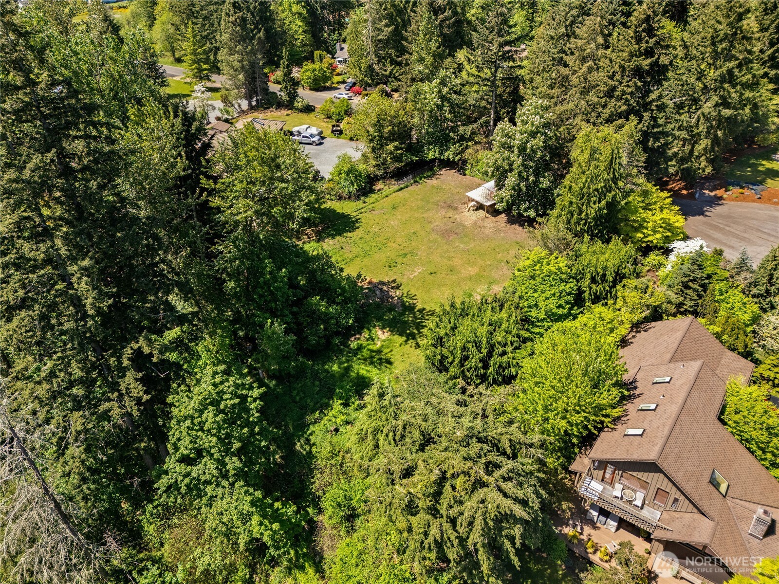 23519 Rim Road Graham, WA 98338 - Photo 9 of 23 an aerial view of residential house with green space