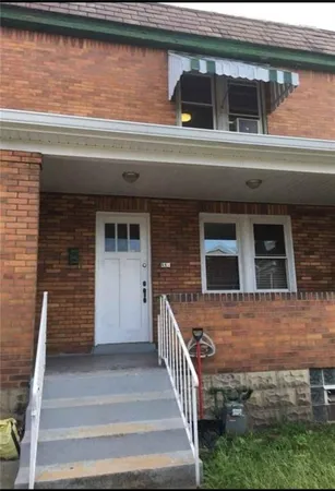a front view of a house with a window
