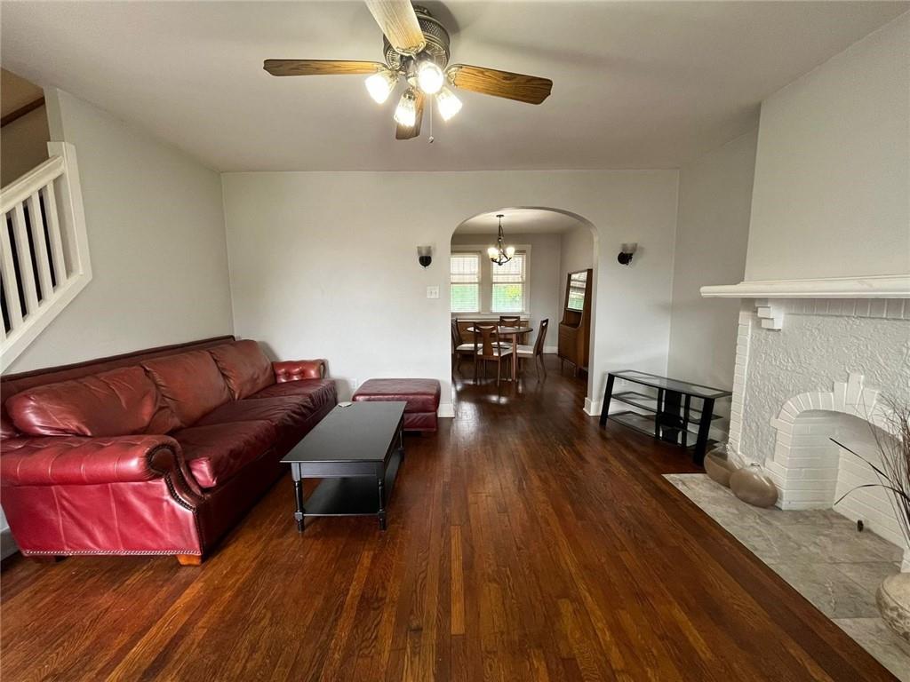518 Belgreen Place, Unit 516 Pittsburgh, PA 15213 - Photo 3 of 17 a living room with furniture and a chandelier