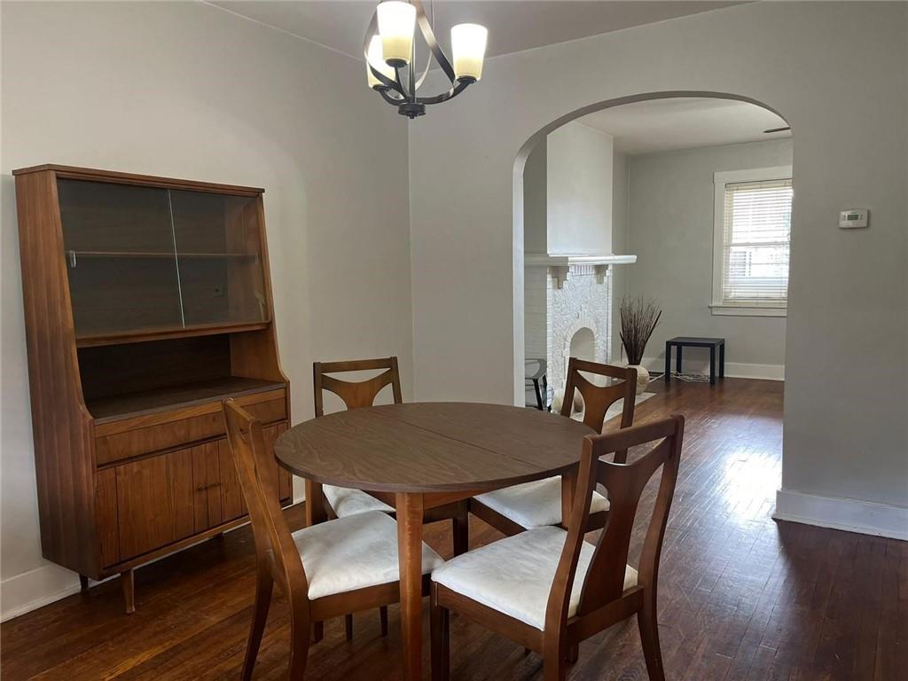 518 Belgreen Place, Unit 516 Pittsburgh, PA 15213 - Photo 5 of 17 a view of a dining room with furniture and wooden floor