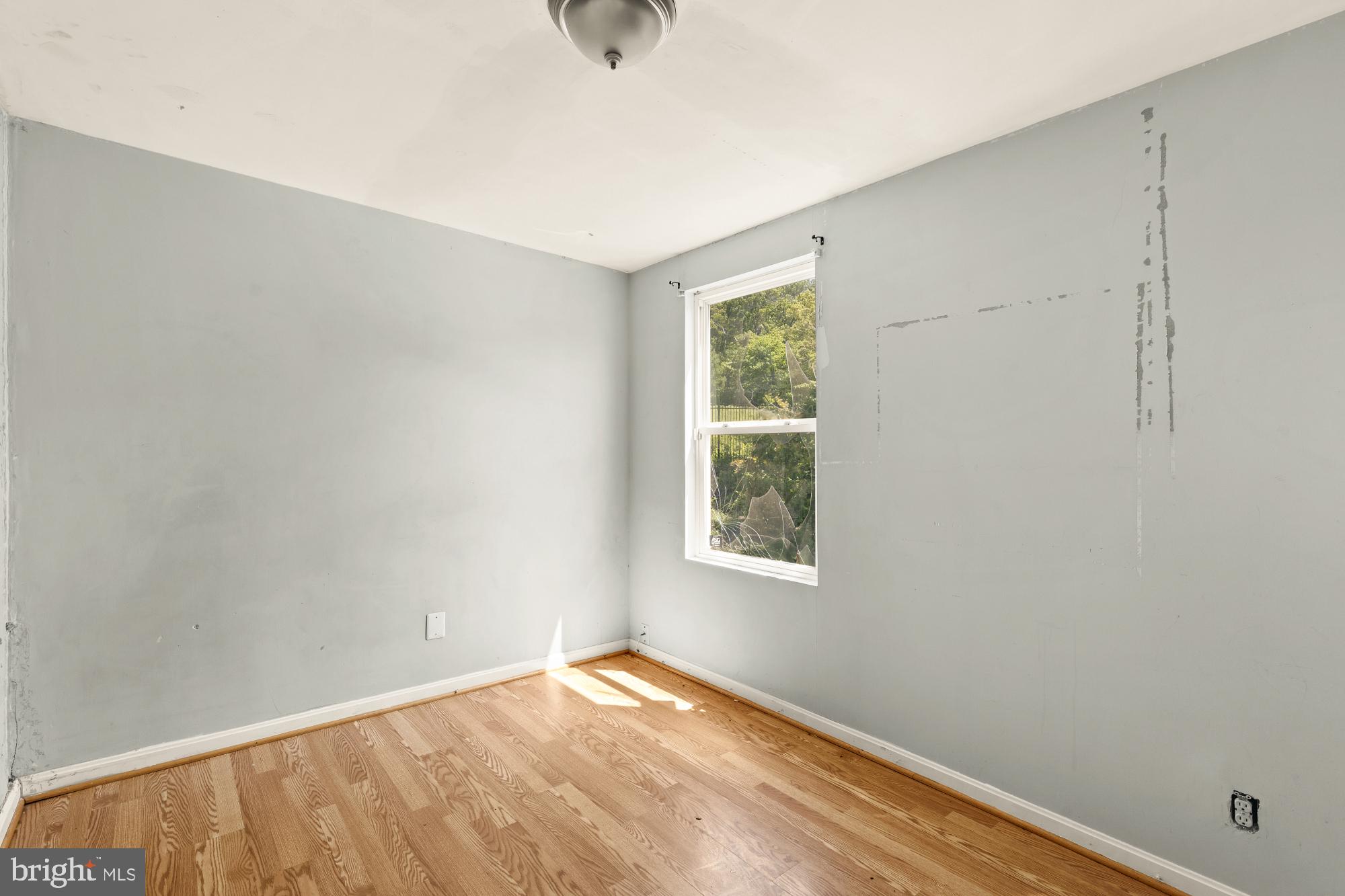 1227 18th Place Northeast Washington, DC 20002 - Photo 19 of 23 an empty room with a window