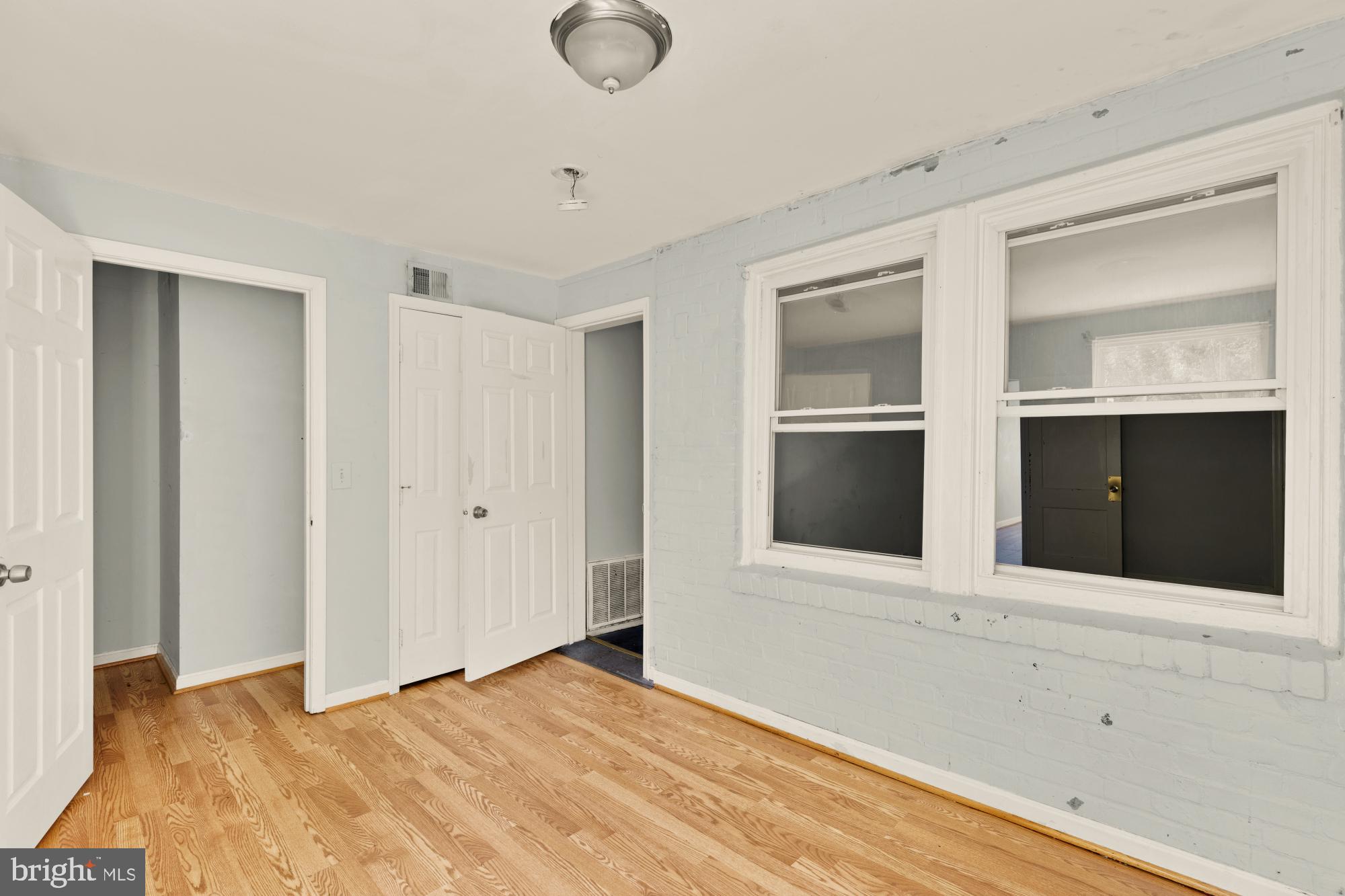 1227 18th Place Northeast Washington, DC 20002 - Photo 20 of 23 a view of an empty room with a fireplace and cabinet