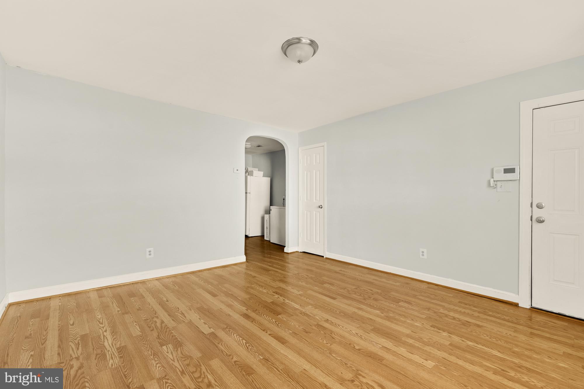 1227 18th Place Northeast Washington, DC 20002 - Photo 8 of 23 a view of an empty room with wooden floor