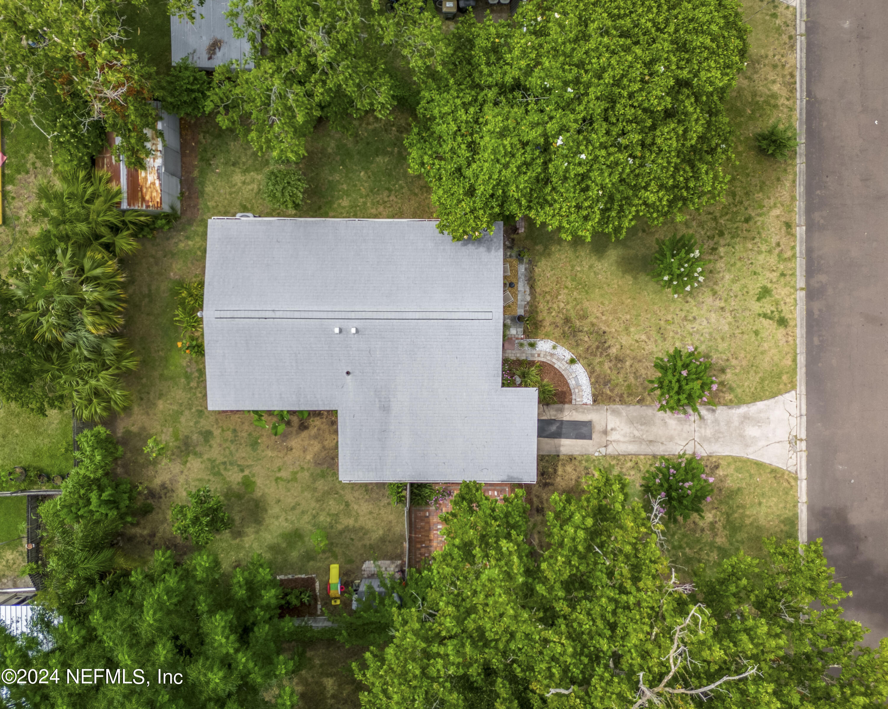 381 Sargo Road Atlantic Beach, FL 32233 - Photo 20 of 24 a view of house backyard and tree