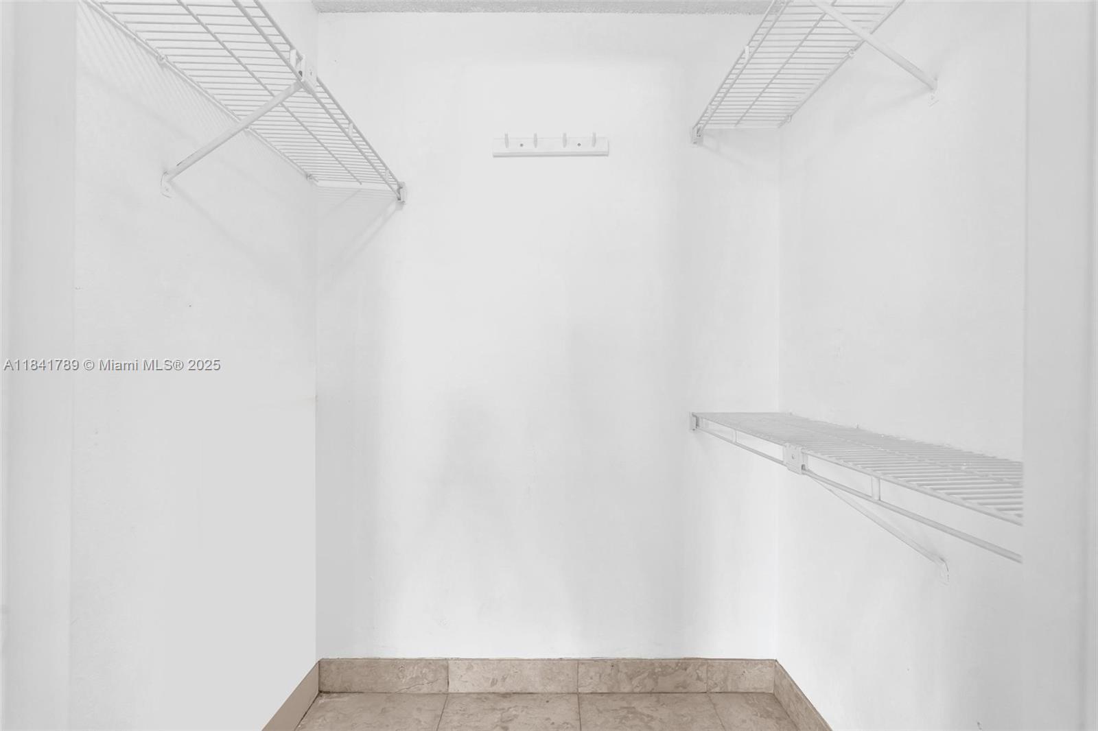 2796 South University Drive, Unit 2104 Davie, FL 33328 - Photo 17 of 41 a view of small space with racks on the wall