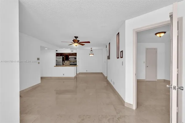 a view of a hallway view with staircase