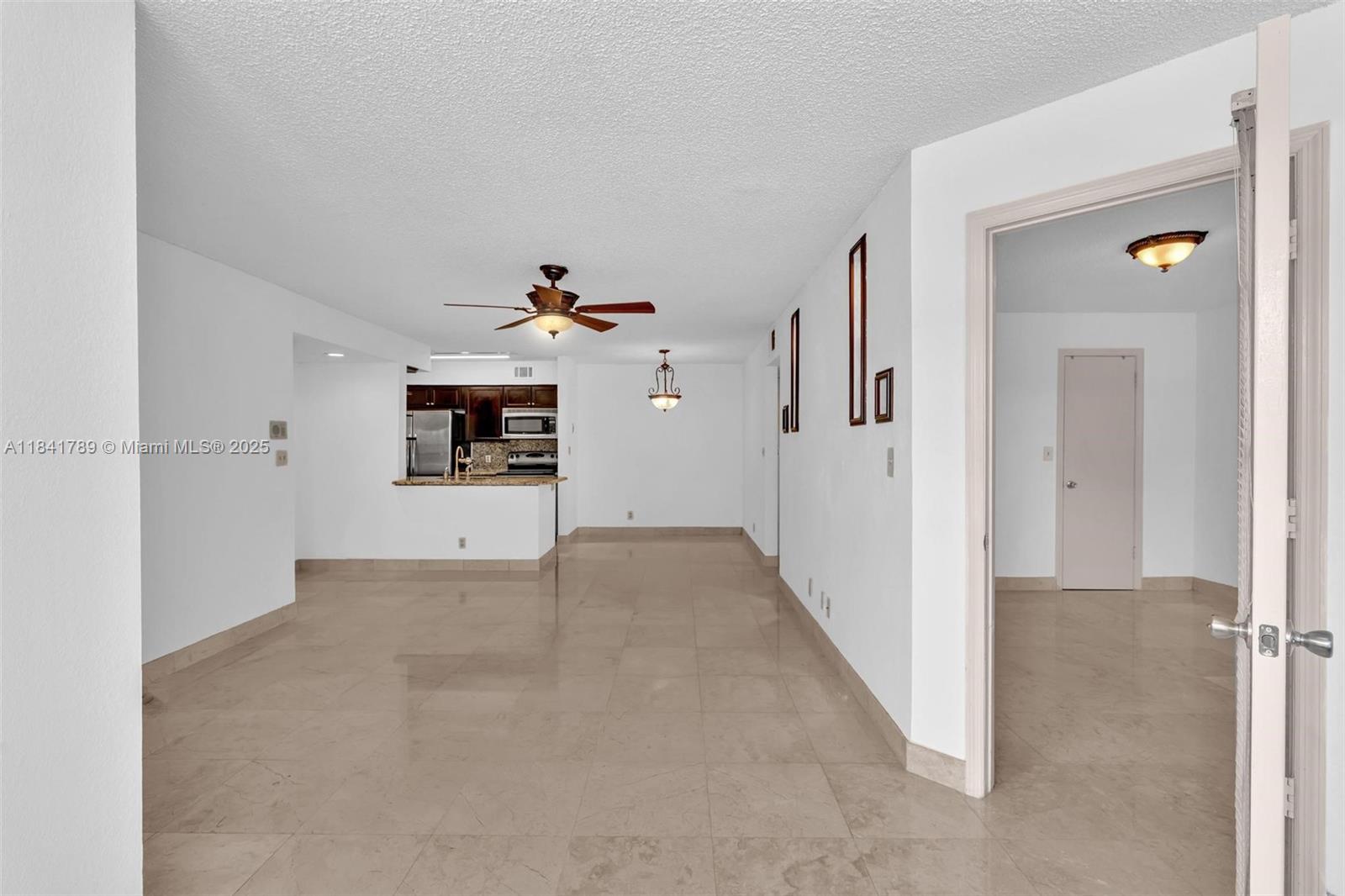 2796 South University Drive, Unit 2104 Davie, FL 33328 - Photo 19 of 41 a view of a hallway view with staircase