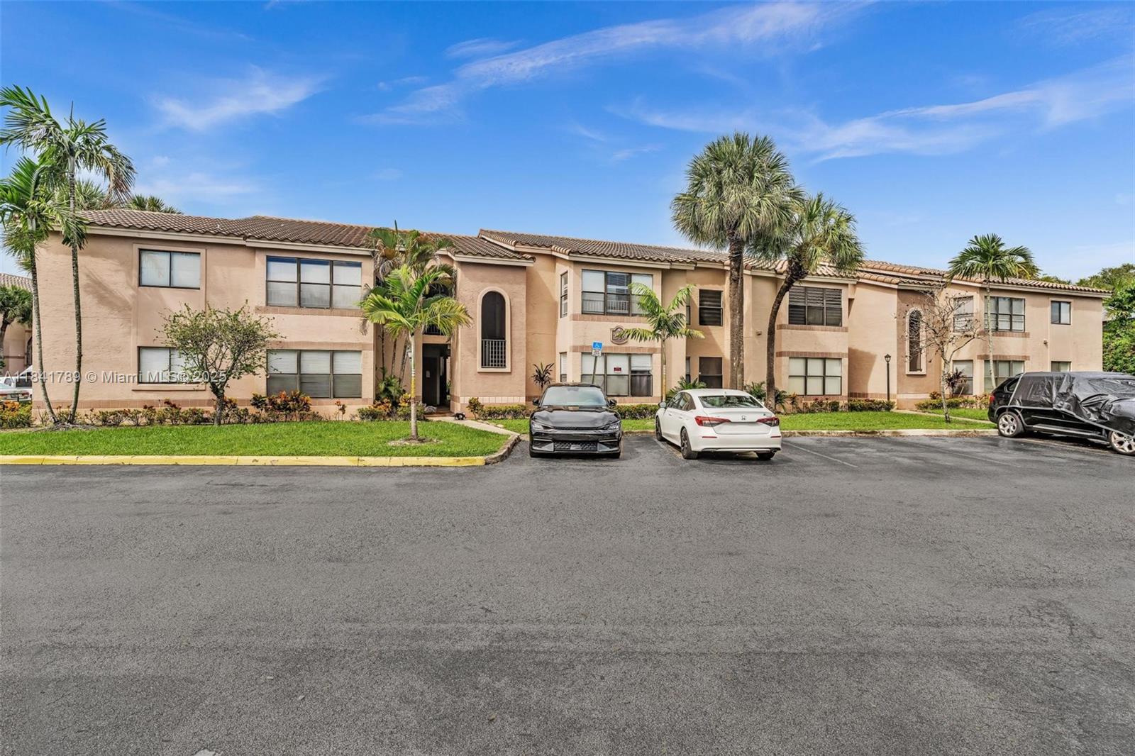 2796 South University Drive, Unit 2104 Davie, FL 33328 - Photo 28 of 41 a car parked in front of a house