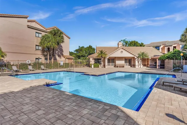 swimming pool view with a outdoor space