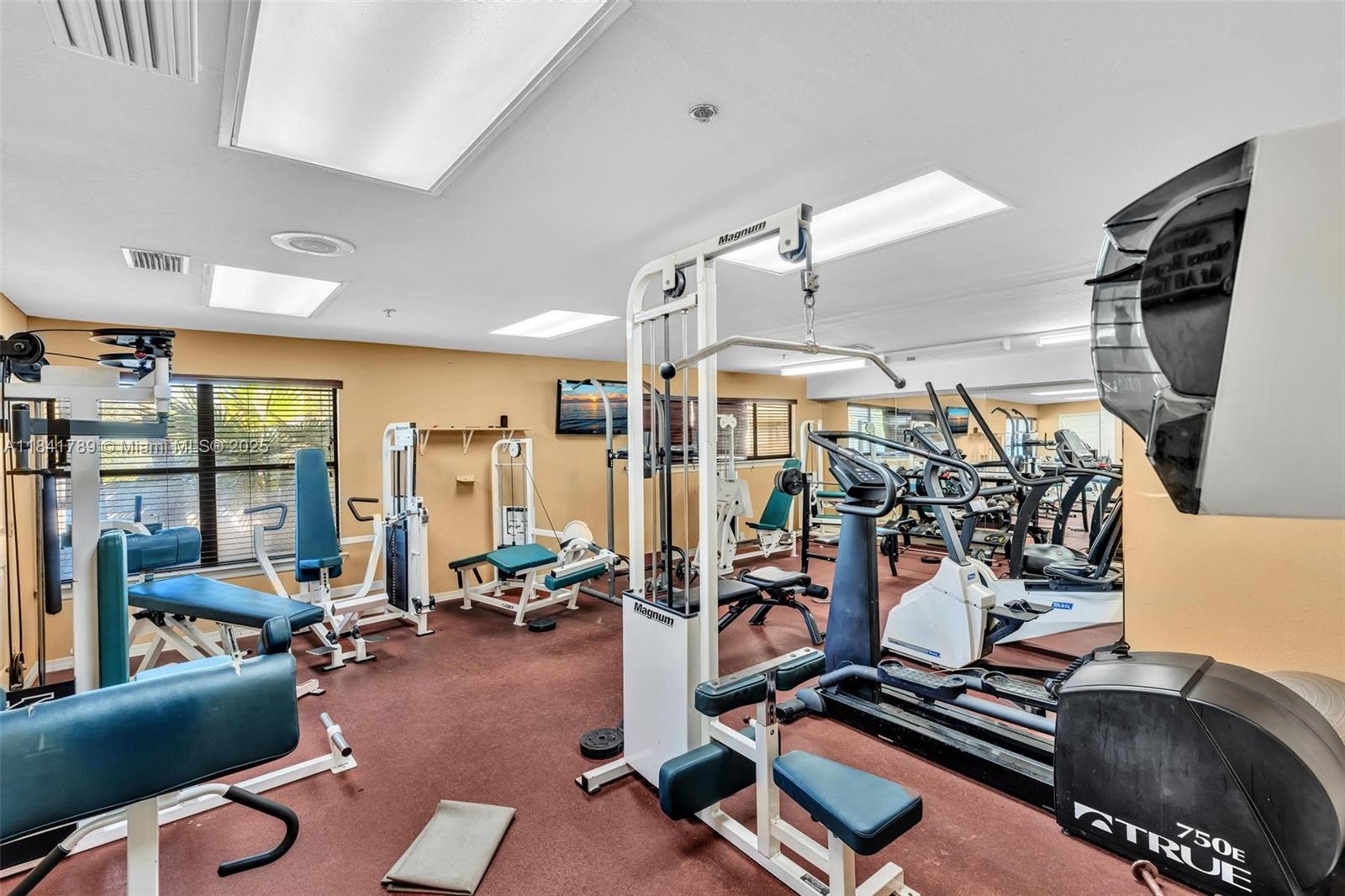 2796 South University Drive, Unit 2104 Davie, FL 33328 - Photo 33 of 41 a view of a room with gym equipment