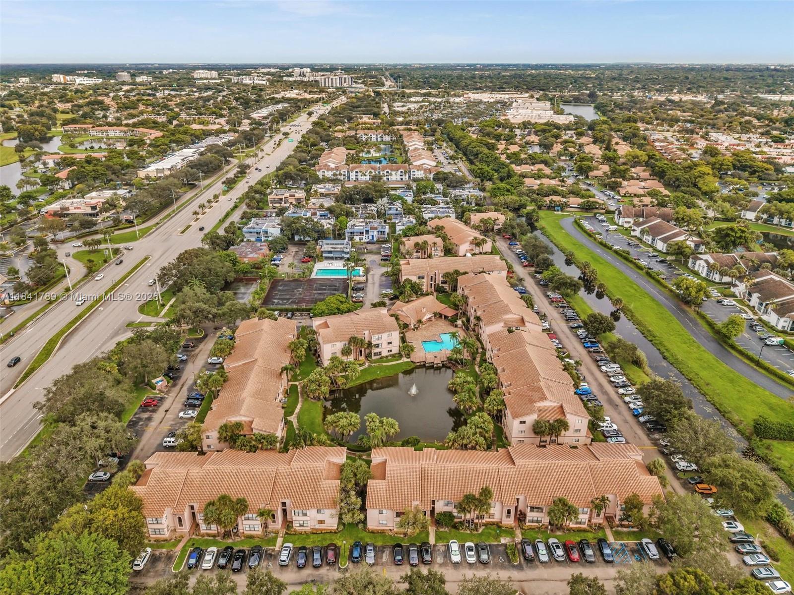 2796 South University Drive, Unit 2104 Davie, FL 33328 - Photo 39 of 41 an aerial view of residential houses with outdoor space