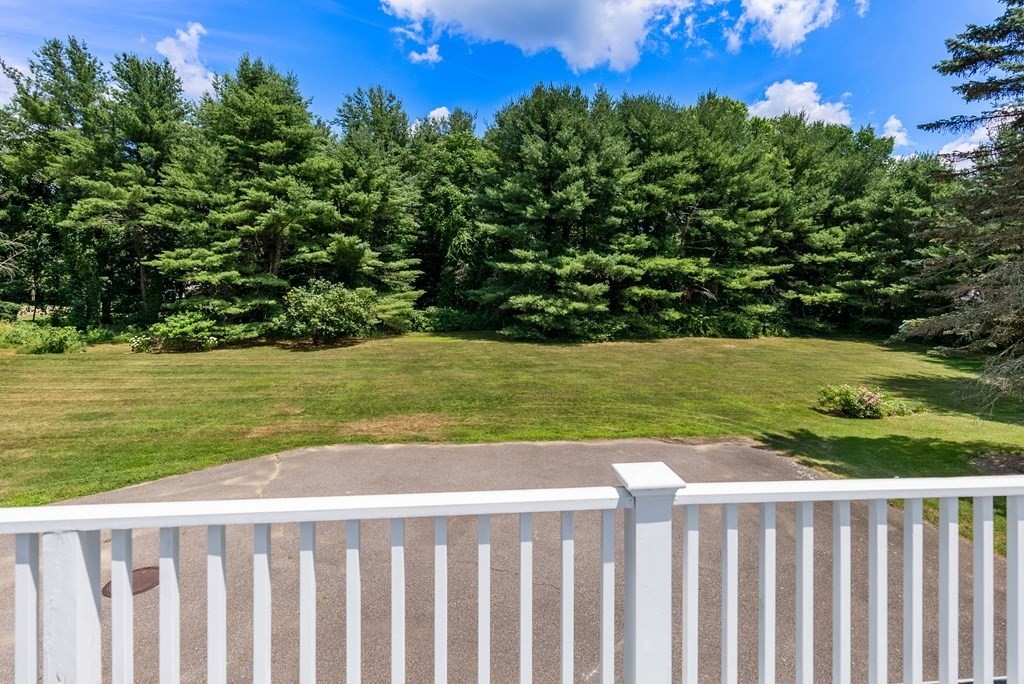29 Sunset Road Weston, MA 02493 - Photo 26 of 29 a view of a yard with wooden fence