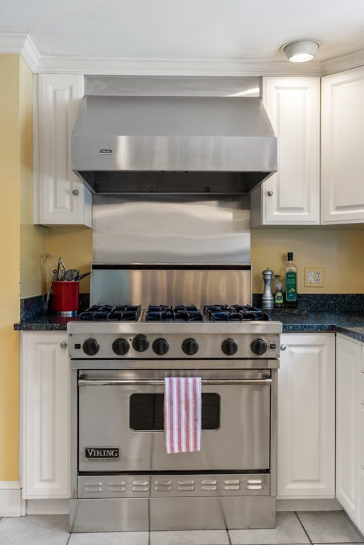 29 Sunset Road Weston, MA 02493 - Photo 7 of 29 a stove top oven sitting inside of a kitchen