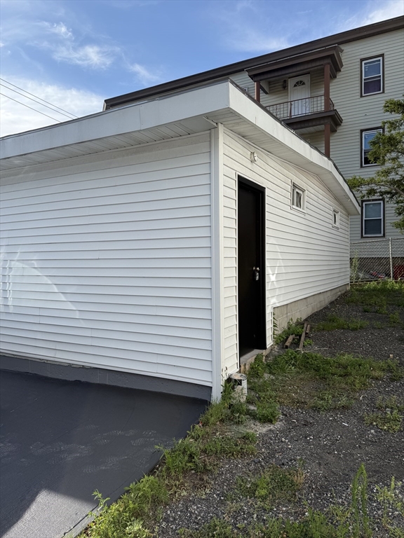 430 Alden Street Fall River, MA 02723 - Photo 3 of 13 a front view of a house with a yard