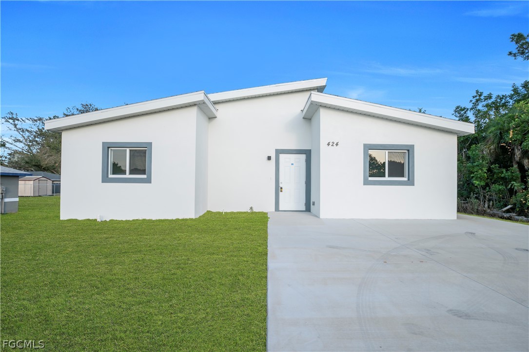 424 Alabama Road South Lehigh Acres, FL 33936 - Photo 1 of 28