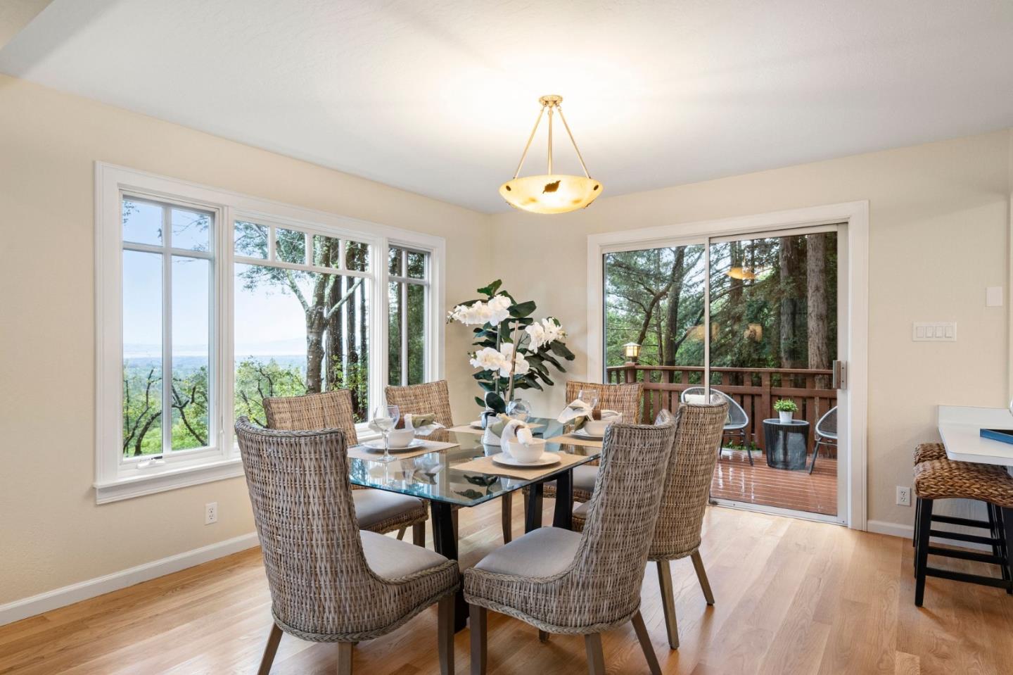555 Summit Spring Road Woodside, CA 94062 - Photo 14 of 90 a view of a dining room with furniture window and outside view