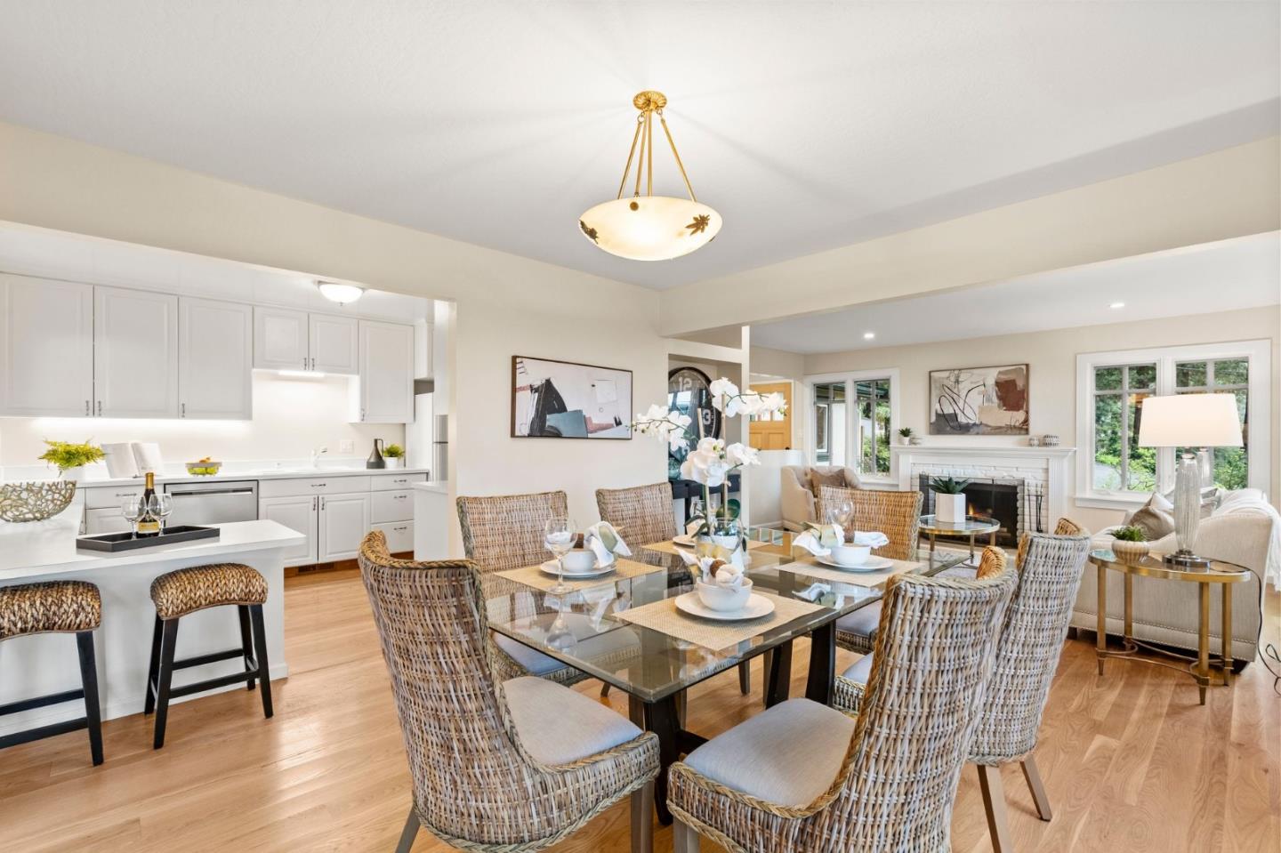 555 Summit Spring Road Woodside, CA 94062 - Photo 15 of 90 a view of a dining room with furniture wooden floor and chandelier